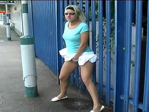 Desperate - Woman Standing Pees, in the train station