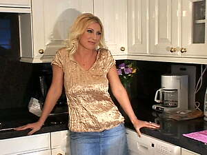 Blonde mom with perfect melons is seducing pool boy for sex on the kitchen